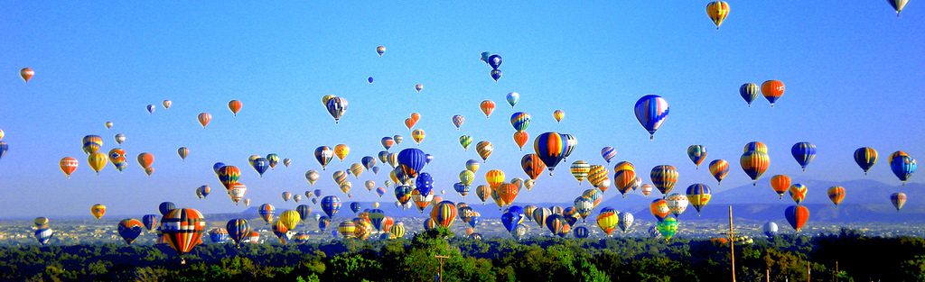 Mass ascension of hot air balloons over Albuquerque Fiesta